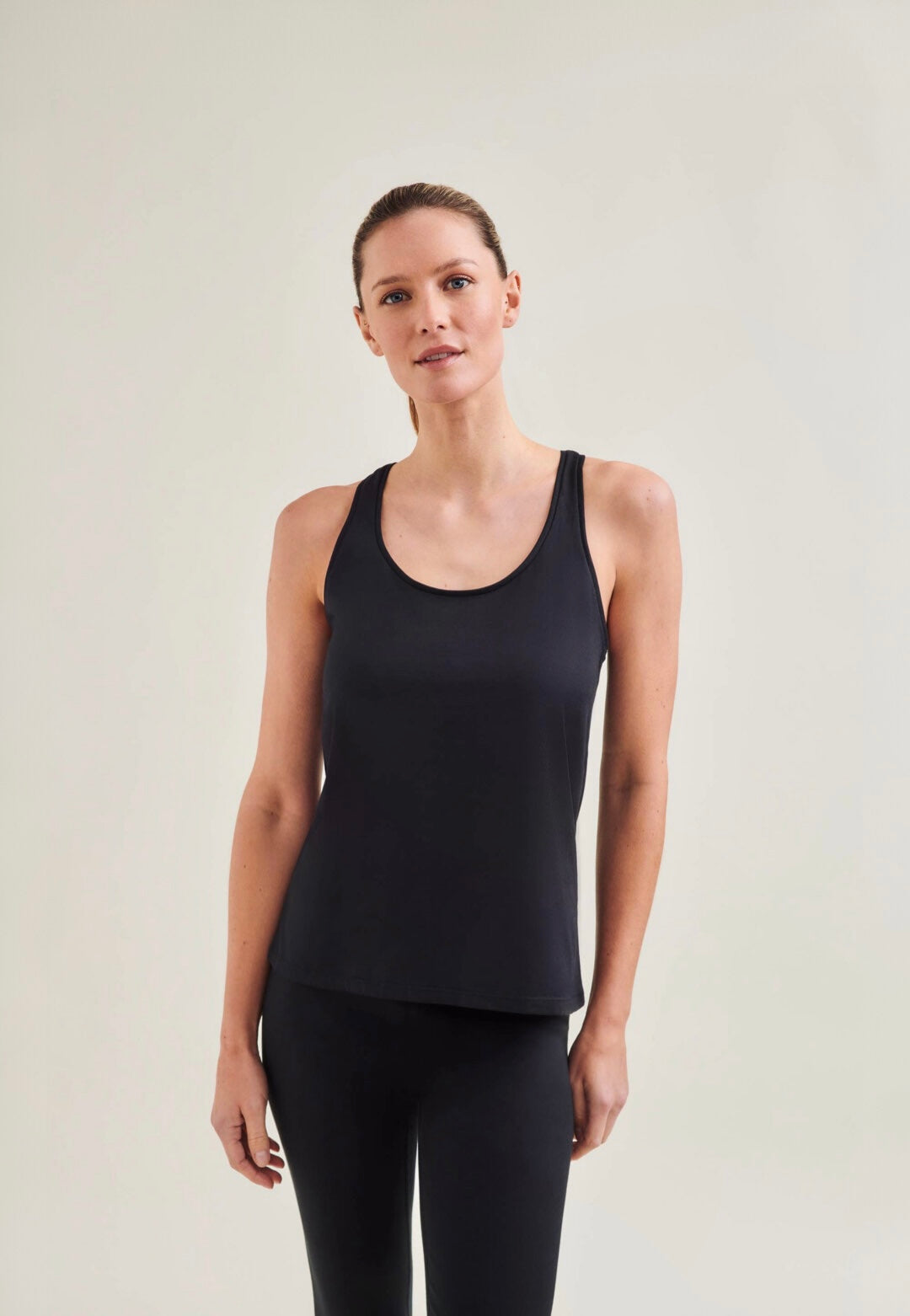 GOTS certified organic cotton yoga racer tank in Caviar Black - No microplastic & Non-Toxic activewear  