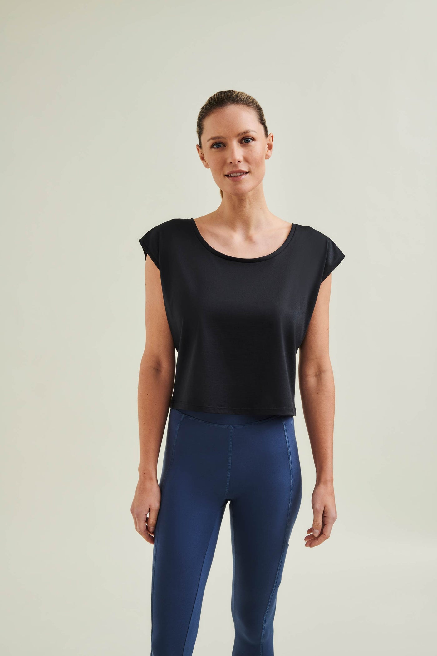 Zero-waste activewear cropped top in Caviar Black - Conscious circular fashion for yoga, gym and     Pilates routines